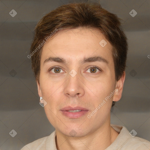 Joyful white adult male with short  brown hair and brown eyes