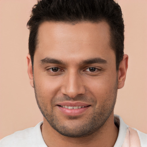 Joyful white young-adult male with short  brown hair and brown eyes