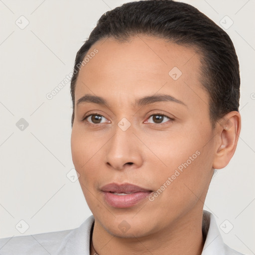 Joyful white young-adult female with short  brown hair and brown eyes