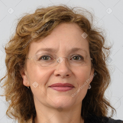 Joyful white adult female with long  brown hair and brown eyes