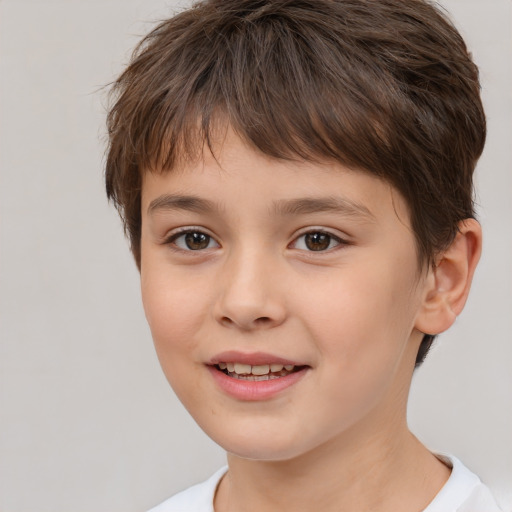 Joyful white child female with short  brown hair and brown eyes