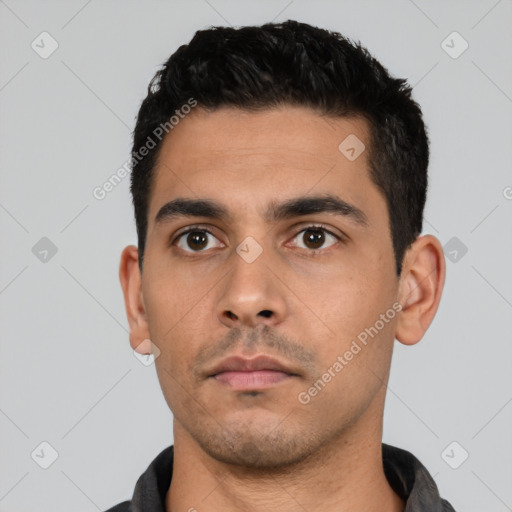 Neutral latino young-adult male with short  black hair and brown eyes