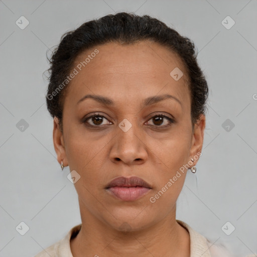 Neutral latino adult female with short  brown hair and brown eyes