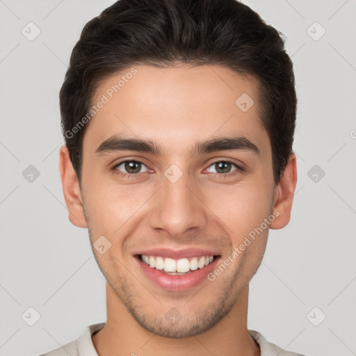 Joyful white young-adult male with short  brown hair and brown eyes