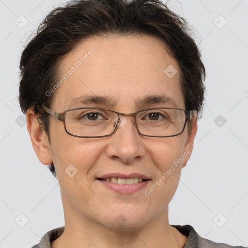 Joyful white adult female with short  brown hair and grey eyes