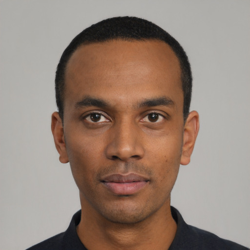 Neutral black young-adult male with short  black hair and brown eyes