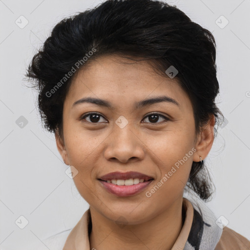 Joyful latino young-adult female with medium  brown hair and brown eyes