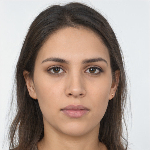 Neutral white young-adult female with long  brown hair and brown eyes