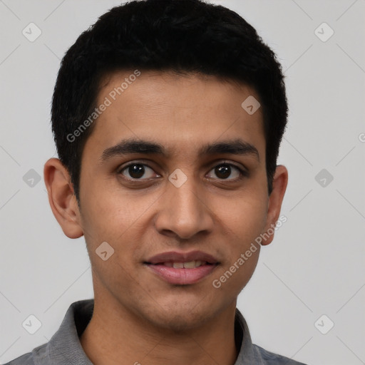 Joyful latino young-adult male with short  brown hair and brown eyes