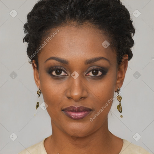 Joyful black young-adult female with short  black hair and brown eyes