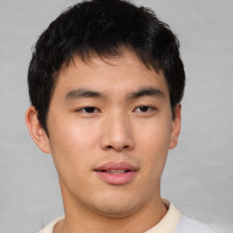 Neutral asian young-adult male with short  brown hair and brown eyes