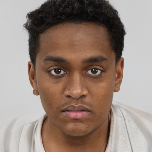 Neutral black young-adult male with short  brown hair and brown eyes