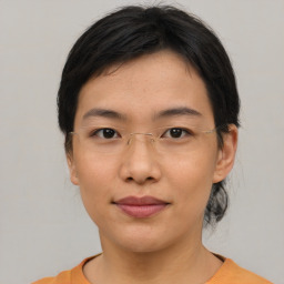 Neutral asian young-adult female with medium  brown hair and brown eyes