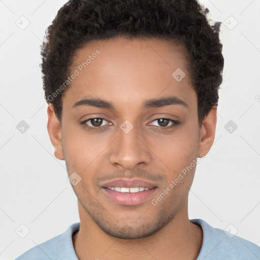 Joyful black young-adult male with short  brown hair and brown eyes