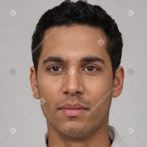Neutral latino young-adult male with short  black hair and brown eyes