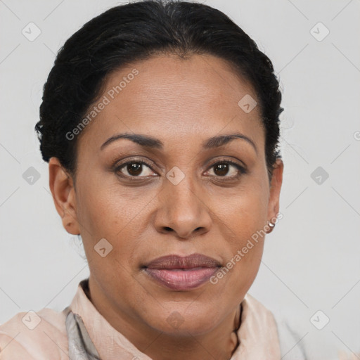 Joyful latino adult female with short  brown hair and brown eyes