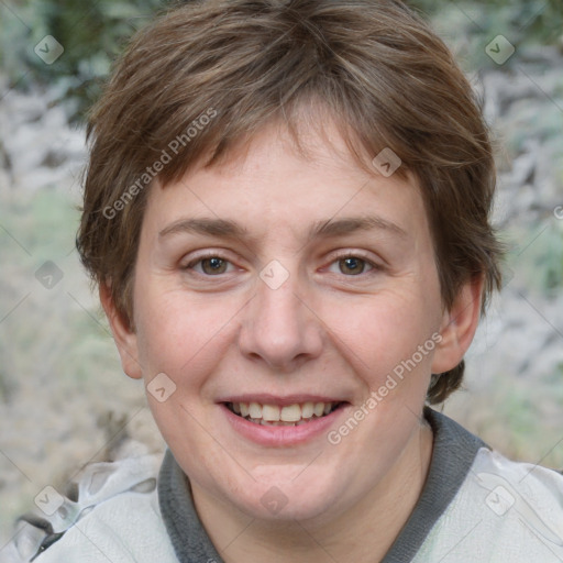 Joyful white adult female with short  brown hair and grey eyes