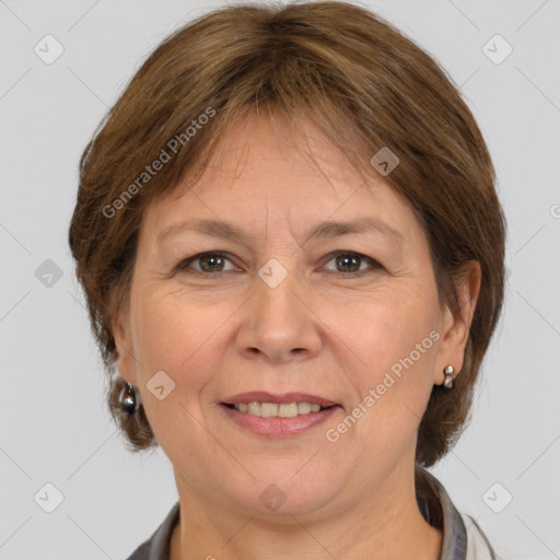 Joyful white adult female with medium  brown hair and grey eyes