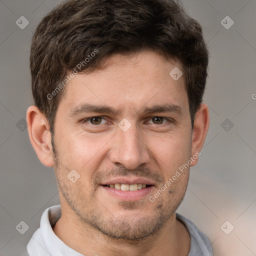 Joyful white young-adult male with short  brown hair and brown eyes