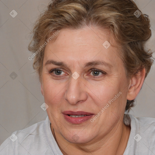 Joyful white adult female with short  brown hair and brown eyes