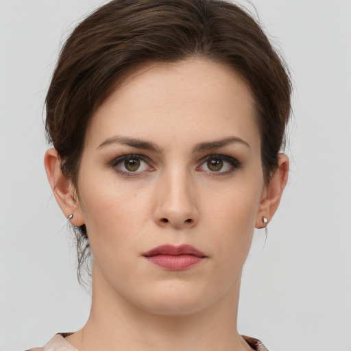 Neutral white young-adult female with medium  brown hair and brown eyes