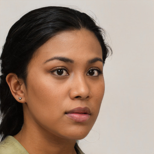 Neutral latino young-adult female with medium  black hair and brown eyes
