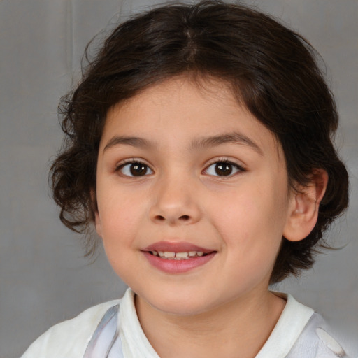 Joyful white child female with medium  brown hair and brown eyes