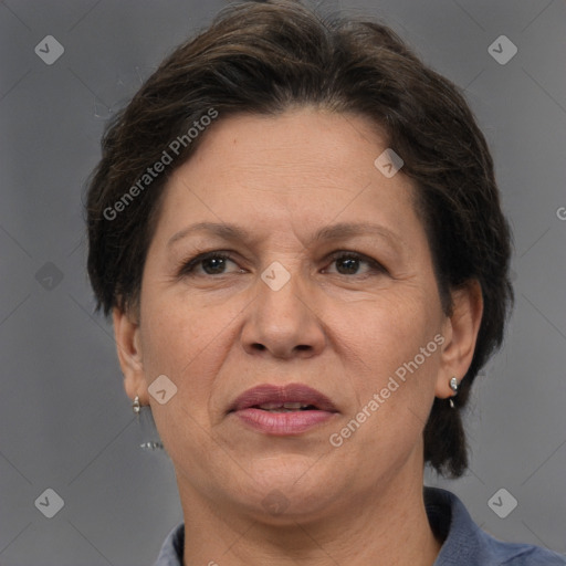 Joyful white adult female with short  brown hair and brown eyes