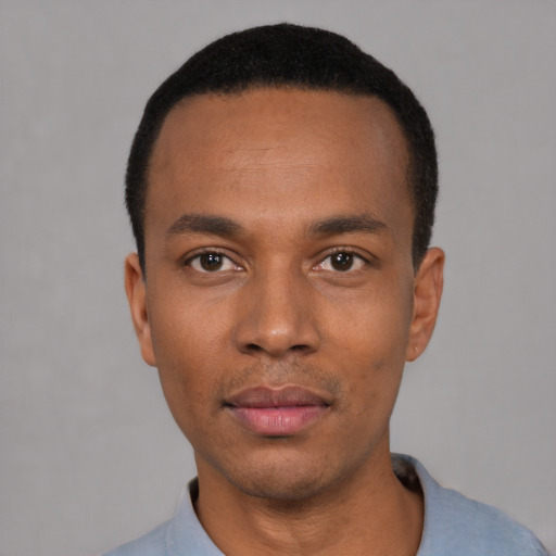Neutral black young-adult male with short  black hair and brown eyes