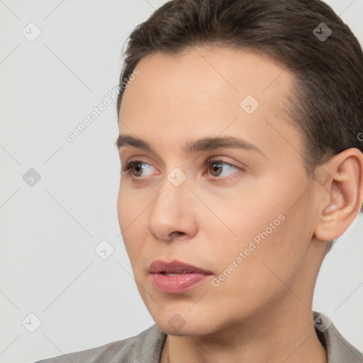 Neutral white young-adult female with short  brown hair and brown eyes