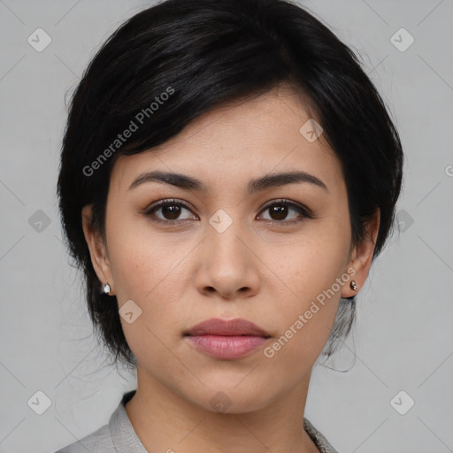 Joyful asian young-adult female with medium  black hair and brown eyes