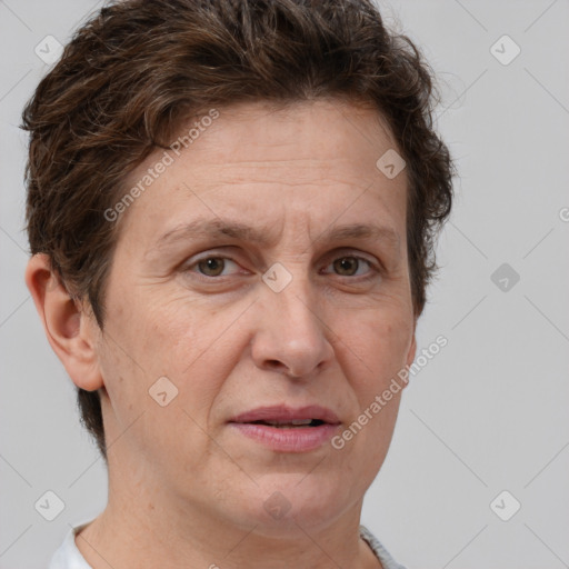 Joyful white adult female with short  brown hair and brown eyes