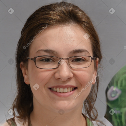 Joyful white adult female with medium  brown hair and brown eyes