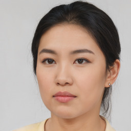 Neutral asian young-adult female with medium  brown hair and brown eyes