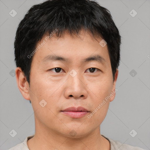 Neutral asian young-adult male with short  black hair and brown eyes