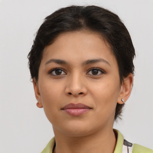 Joyful asian young-adult female with short  brown hair and brown eyes