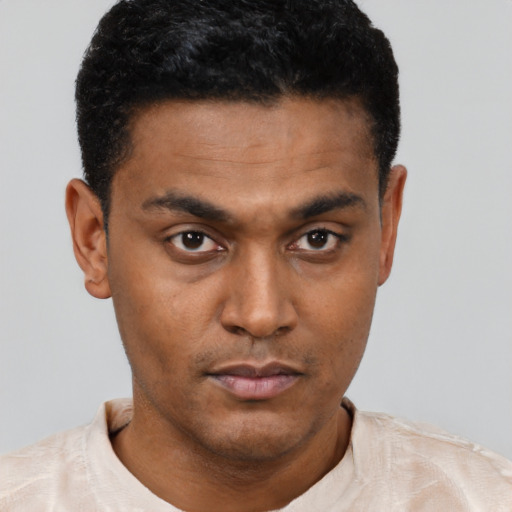 Neutral latino young-adult male with short  black hair and brown eyes
