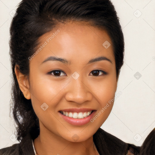 Joyful latino young-adult female with long  brown hair and brown eyes