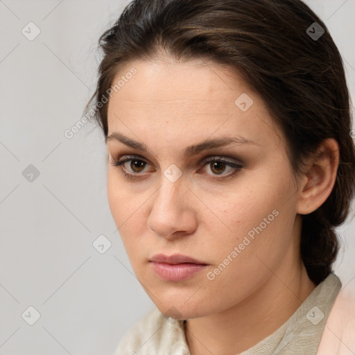 Neutral white young-adult female with medium  brown hair and brown eyes