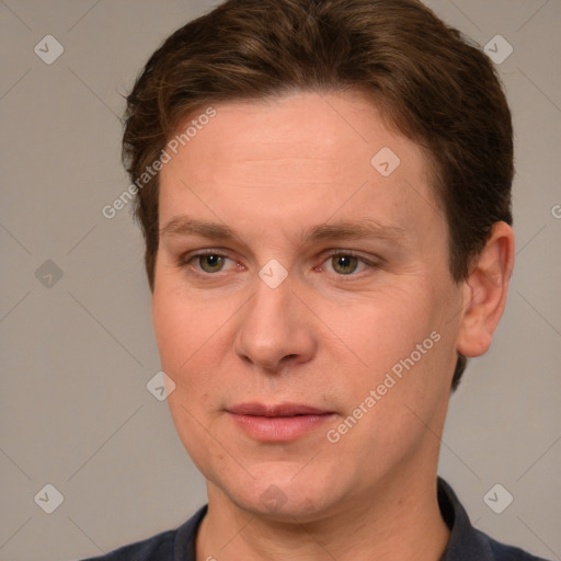 Joyful white adult female with short  brown hair and grey eyes