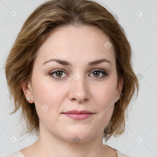 Joyful white young-adult female with medium  brown hair and green eyes