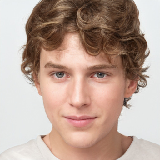 Joyful white young-adult male with short  brown hair and blue eyes