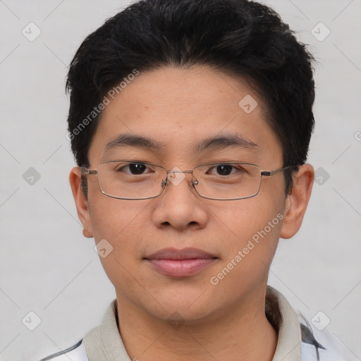 Joyful asian young-adult male with short  brown hair and brown eyes