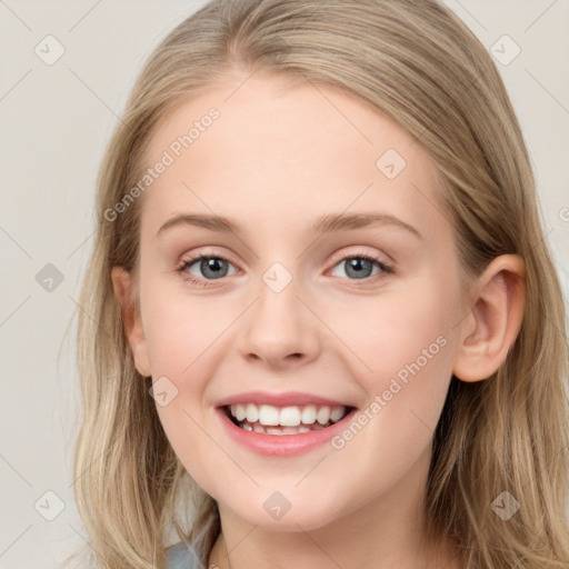 Joyful white young-adult female with long  brown hair and blue eyes