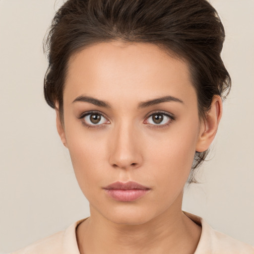 Neutral white young-adult female with medium  brown hair and brown eyes