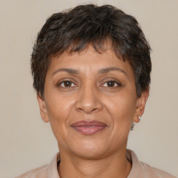Joyful white adult female with short  brown hair and brown eyes