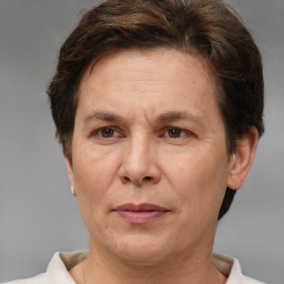 Joyful white adult female with short  brown hair and brown eyes