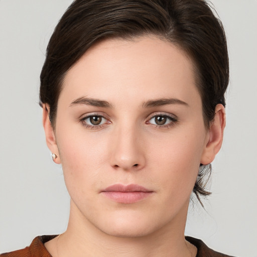 Neutral white young-adult female with medium  brown hair and brown eyes