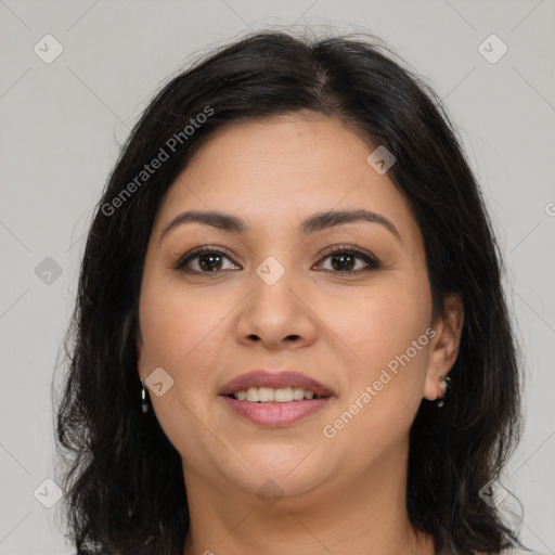 Joyful latino young-adult female with medium  brown hair and brown eyes