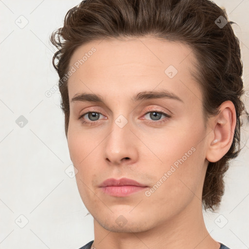 Neutral white young-adult male with medium  brown hair and brown eyes